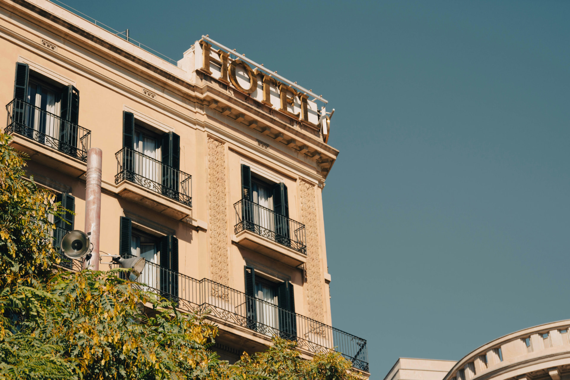 upscale hotel exterior or room, editorial style