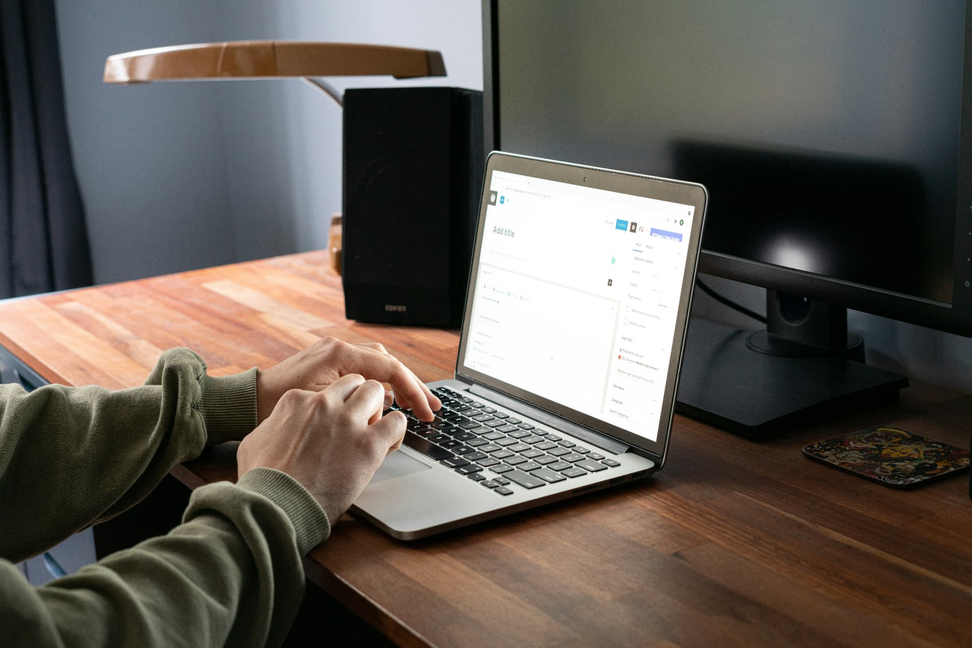workspace with laptop showing a booking screen